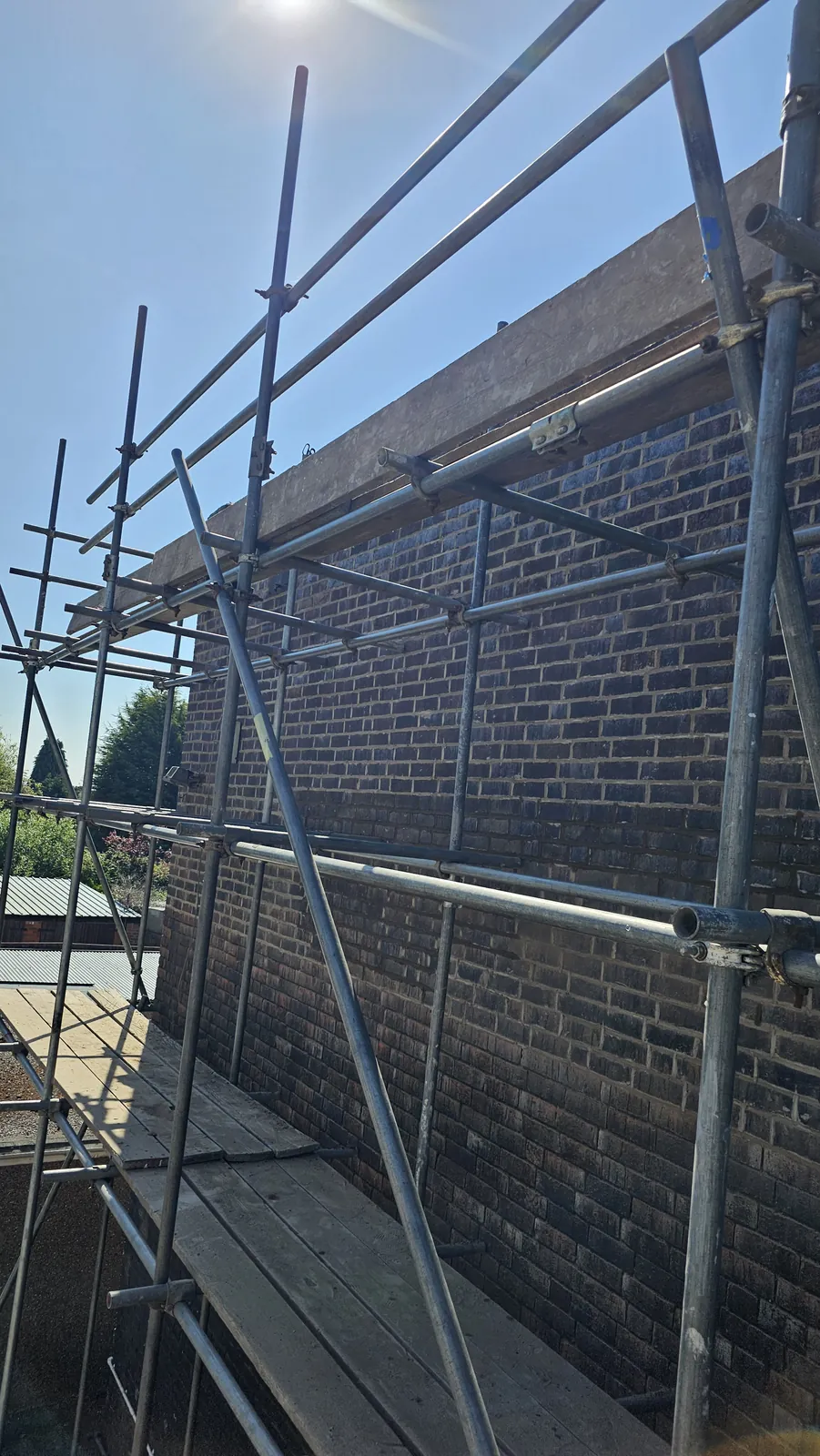 Fresh mortar on ridge tiles