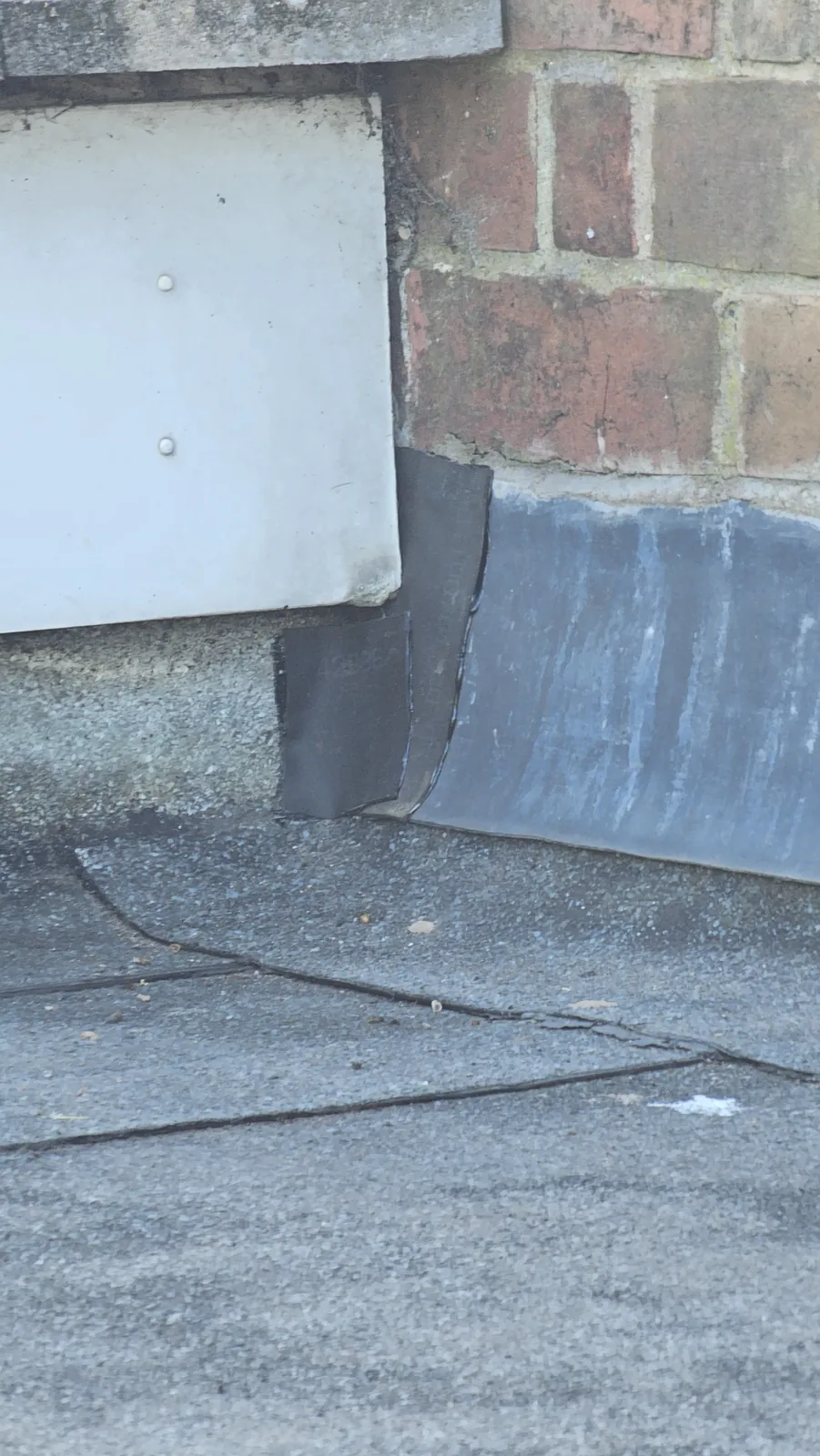Roofer carrying out a repair
